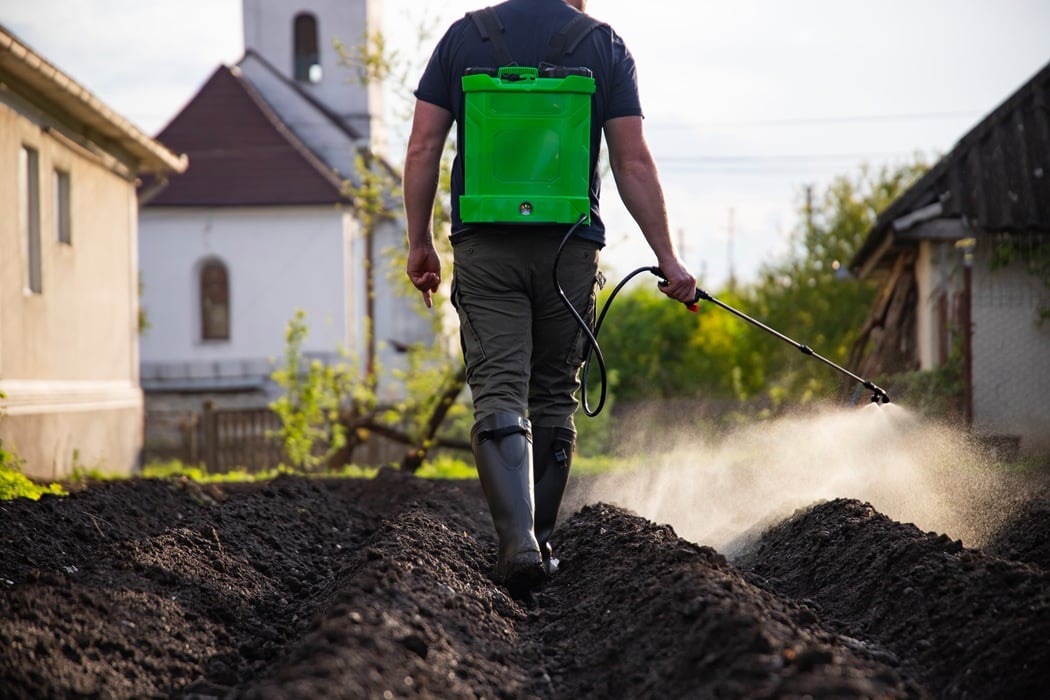 American Tree Experts performing nutrient management services for a Montclair homeowner